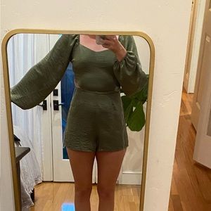 Le lis romper from left in thread. Size xs. nWT. Just a smidge too small for me
